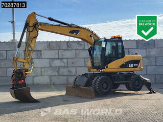صورة ل حفارات بعجلات 2007 كاتربيلر M313D