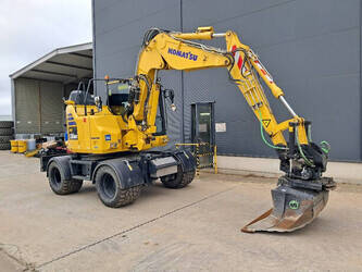 صورة ل حفارات بعجلات 2023 كوماتسو PW138MR-11E0