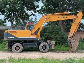 صورة ل حفارات بعجلات 2021 هيونداي R210W-9