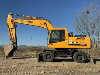 صورة ل حفارات بعجلات 2020 هيونداي 210W-7