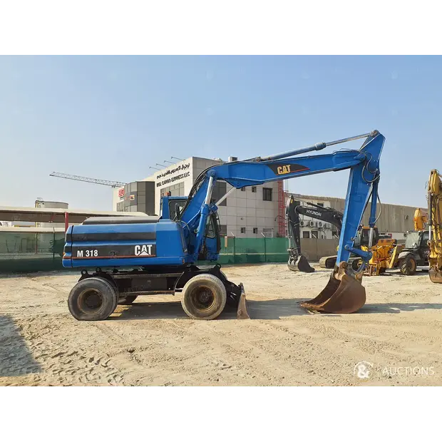 2004 Caterpillar M318-43943303