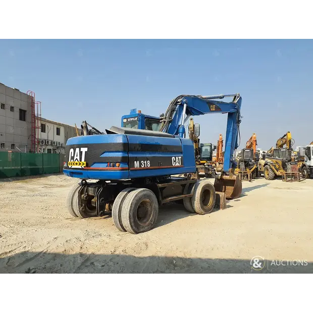 2004 Caterpillar M318-43943305