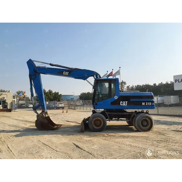 2004 Caterpillar M318-43943309