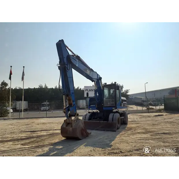 2004 Caterpillar M318-43943311