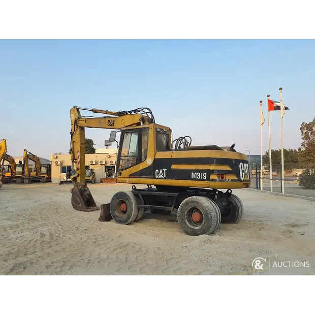 2002 كاتربيلر M318-43964755