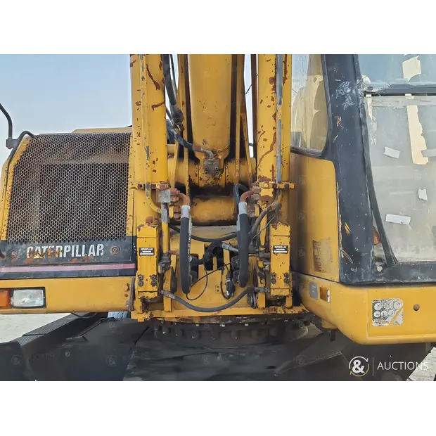 2002 كاتربيلر M318-43964785