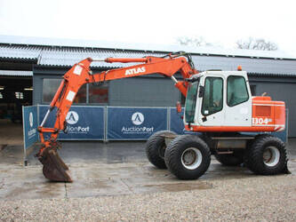 صورة ل حفارات بعجلات اطلس 1304