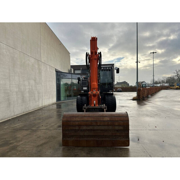 2012 هيتاشى ZX145W-3-44312384