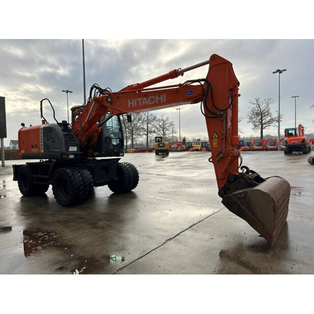 2012 هيتاشى ZX145W-3-44312385
