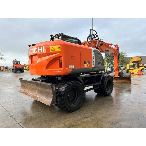 2012 هيتاشى ZX145W-3-44312386