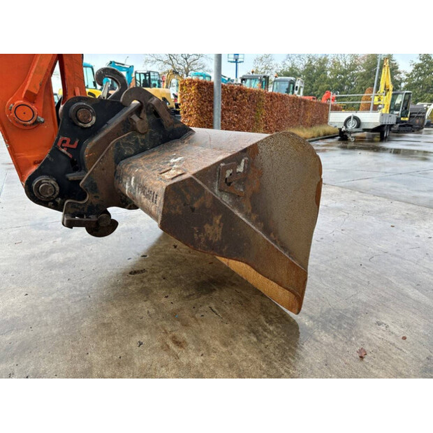 2012 هيتاشى ZX145W-3-44312393