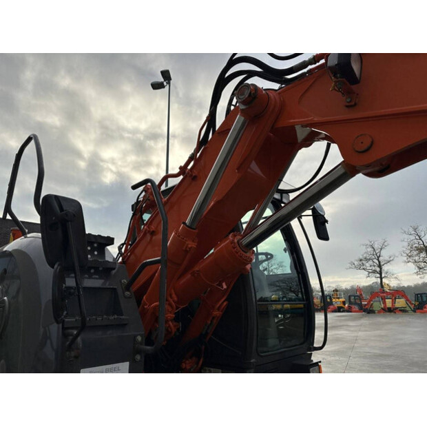 2012 هيتاشى ZX145W-3-44312398