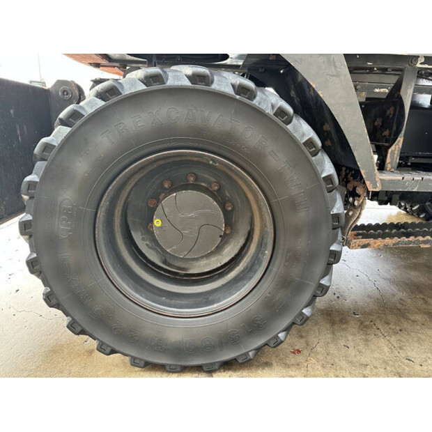 2012 هيتاشى ZX145W-3-44312408