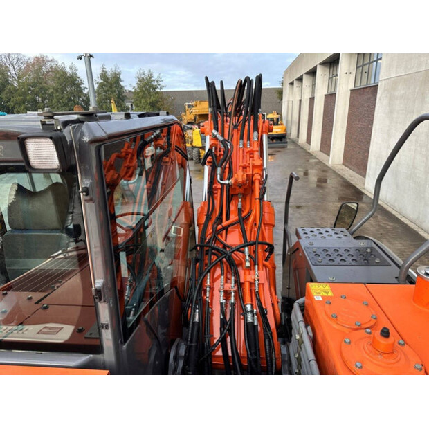 2012 هيتاشى ZX145W-3-44312411