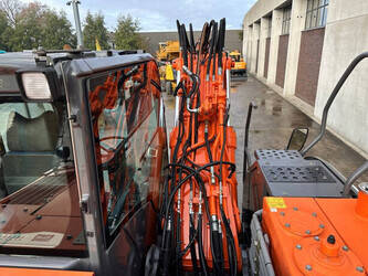 2012-hitachi-zx145w-3-1394846-44312411