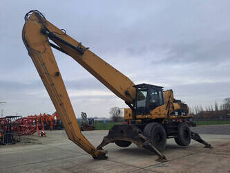 2009-caterpillar-m325d-mh-45326552