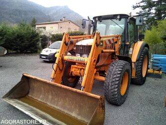 صورة ل تراكتورات زراعية 2002 جون دير 6220