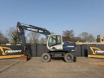 صورة ل حفارات بعجلات 2006 نيو هولاند كوبلكو MH Plus C