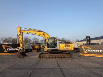 صورة ل حفارات مجنزرة 2006 نيو هولاند Kobelco E215