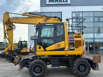 صورة ل حفارات بعجلات 2024 كوماتسو 11