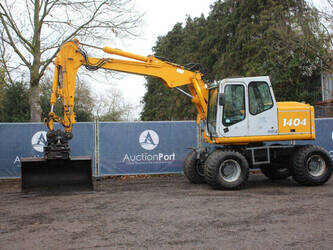 صورة ل حفارات بعجلات 2000 اطلس 1404