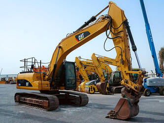 2011-caterpillar-320dl-1451101-cover-image