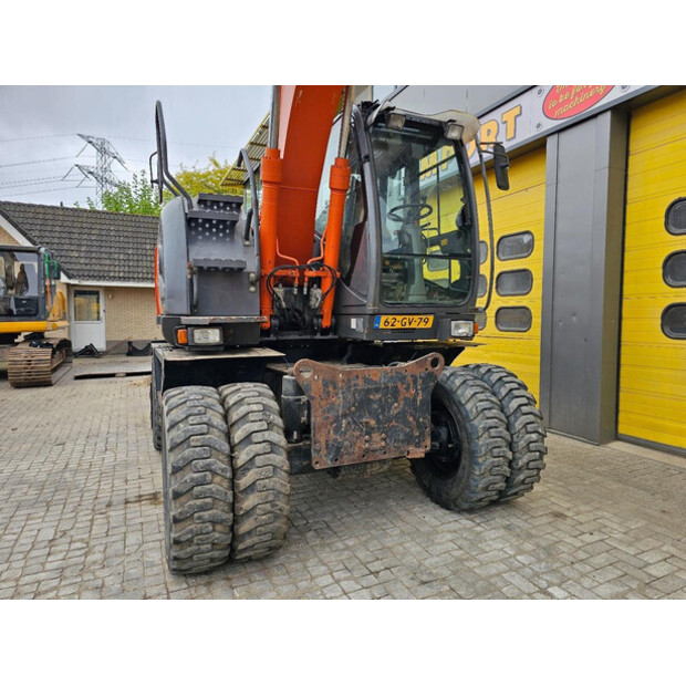 2010 هيتاشى ZX140W-3-47244416