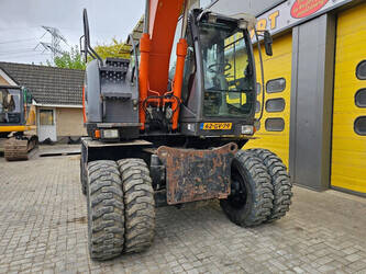 2010-hitachi-zx140w-3-1453787-47244416