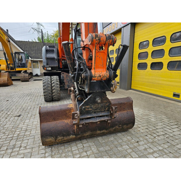2010 هيتاشى ZX140W-3-47244419