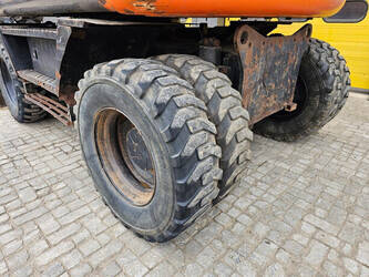2010-hitachi-zx140w-3-1453787-47244432