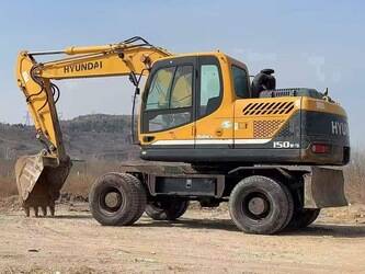 صورة ل حفارات بعجلات 2014 هيونداي روبكس 150W-9