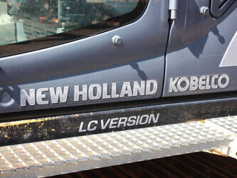 2011-new-holland-e265c-47627667