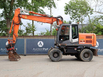 صورة ل حفارات بعجلات 2009 هيتاشى ZX140W-3