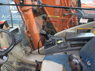 2009-hitachi-zx140w-3-1464866-47961474