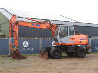 صورة ل حفارات بعجلات 2003 فيات E175W