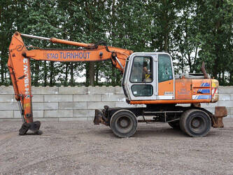 صورة ل حفارات بعجلات 1996 فيات هايتاشي Hitachi 595-A