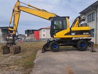 صورة ل حفارات المخلفات 2007 كاتربيلر M318C