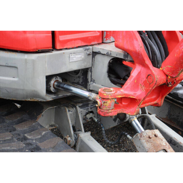 2011 New Holland E50.2C-49244660