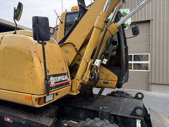2010-caterpillar-m313d-1492212-49271872