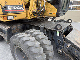 2010-caterpillar-m313d-1492212-49271874