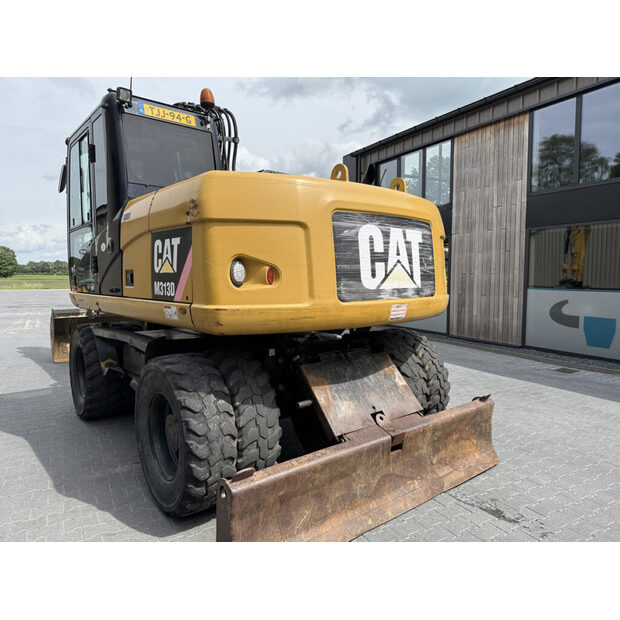 2010 Caterpillar M313D-49321911