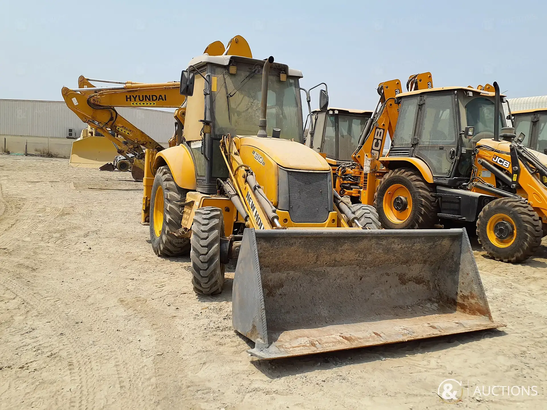 Image de TRACTOPELLES 2015 New Holland B90B