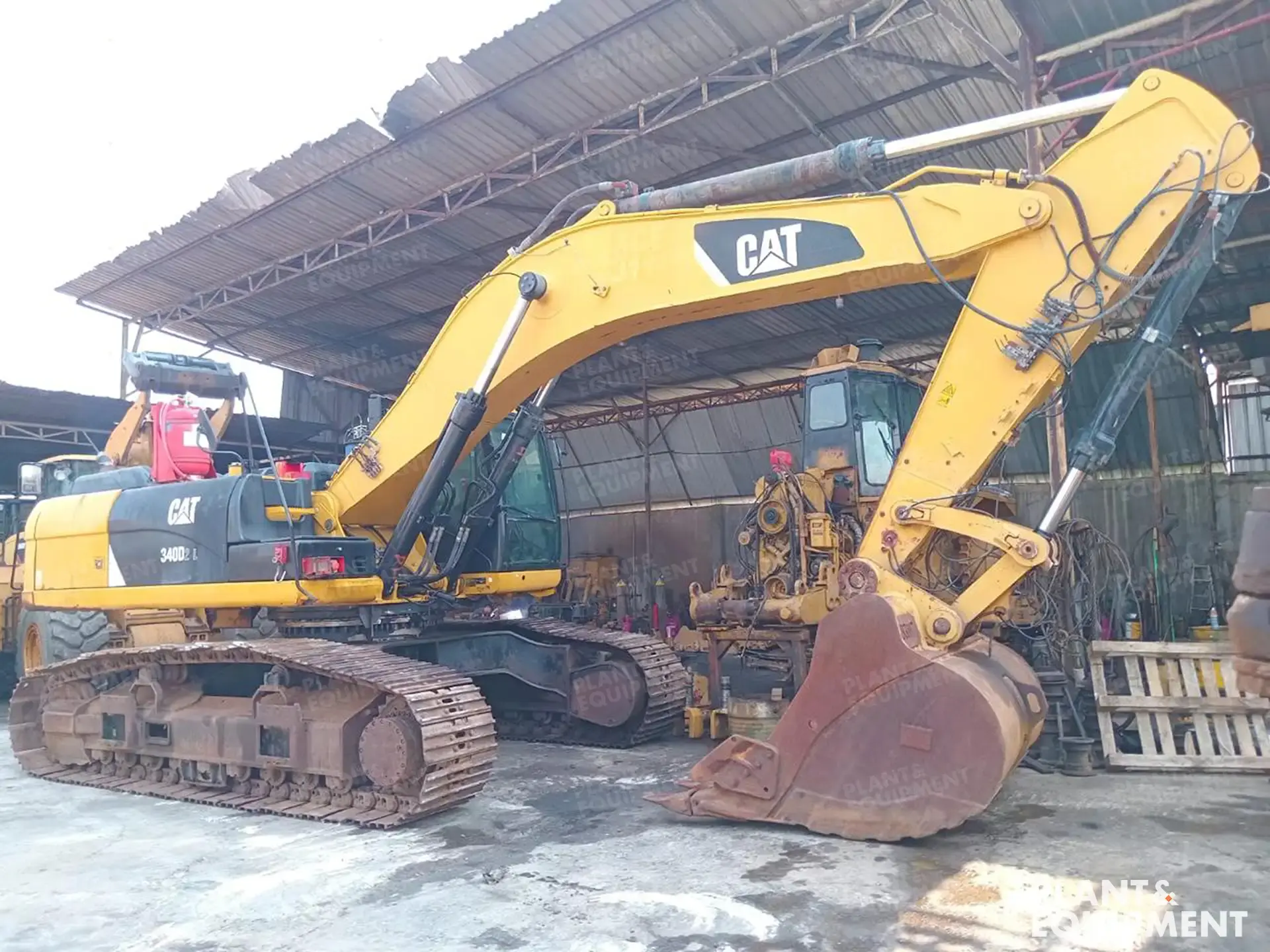 2018-caterpillar-340d2l-1497036-cover-image